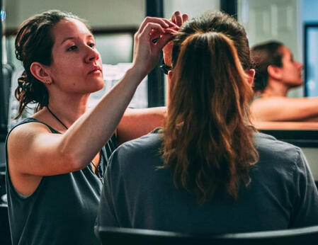 Phoenix styling an actors hair